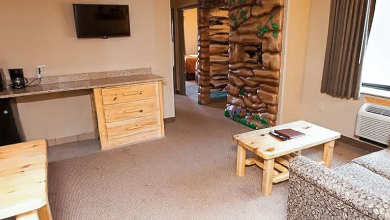 Living area in accessible Grizzly Wolf Den Suite